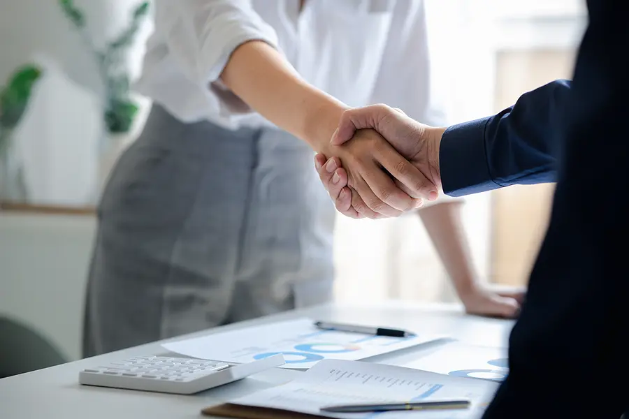 bigstock-Business-Investor-Group-Holdin-472780261
